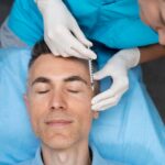 side view patient undergoing physical evaluation 23 2150165419