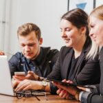 How Collaborative Cybersecurity Consulting Elevates Your Protection St 21 people sitting desk working laptop 23 2147650862