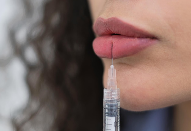 The Science Behind Lip Fillers Injections Explained 1 young woman injecting beauty treatment 144627 24296