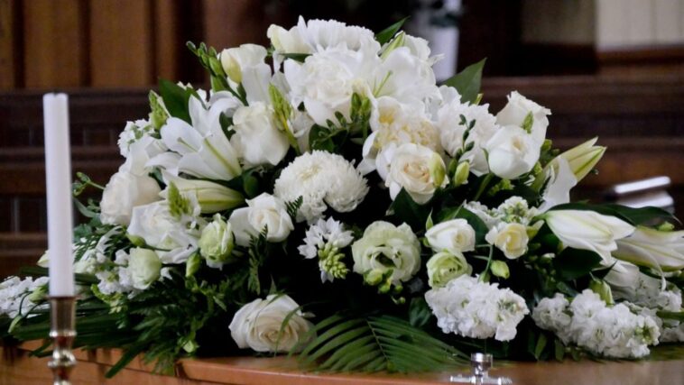 funeral casket arrangement 1080x608 1