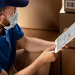 How to Keep Track of Inventory for Small Businesses for Free 20 close up delivery man with tablet 1 1
