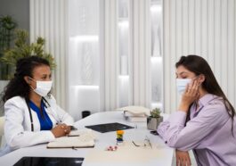 side view doctor patient wearing masks 1