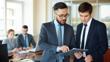 businessman showing changes repo 1