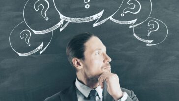 attractive man with question marks min 1