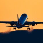 rear view silhouette of an airplane taking off at royalty free image 1695239529 4