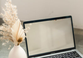 white canvas design agency laptop in the sunlight