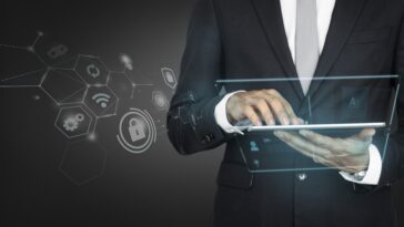 businessman using digital tablet min 1