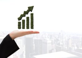 graphic hand with city backgroun