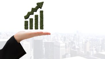 graphic hand with city backgroun