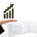 Transform Your Business with Think North’s Busines Consulting Expertis 21 graphic hand with city backgroun 1 1