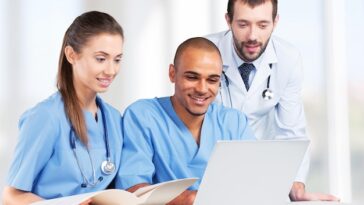 doctors checking results laptop 488220 26842