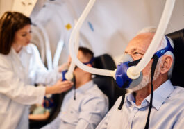 6297da6974746c69ef0b035e senior man breathing through mask during oxygen therapy hyperbaric chamber