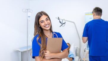 medical professionals standing patients room concept health protection successful team medical doctors are taking care patient 1212 10582